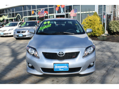 toyota corolla 2009 classic silver sedan s gasoline 4 cylinders front wheel drive automatic 07702