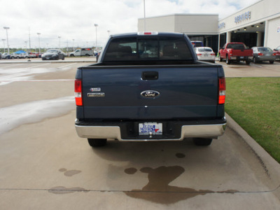 ford f 150 2006 blue xlt gasoline 8 cylinders rear wheel drive automatic with overdrive 76108