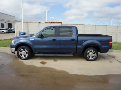 ford f 150 2006 blue xlt gasoline 8 cylinders rear wheel drive automatic with overdrive 76108