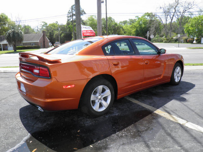 dodge charger 2011 orange sedan gasoline 6 cylinders rear wheel drive automatic 32447