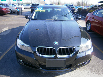 bmw 328i 2009 black sedan gasoline 6 cylinders rear wheel drive 6 speed manual 13502