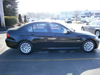 bmw 328i 2009 black sedan gasoline 6 cylinders rear wheel drive 6 speed manual 13502