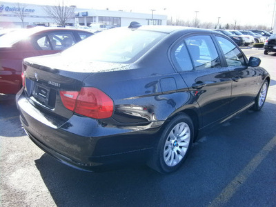 bmw 328i 2009 black sedan gasoline 6 cylinders rear wheel drive 6 speed manual 13502