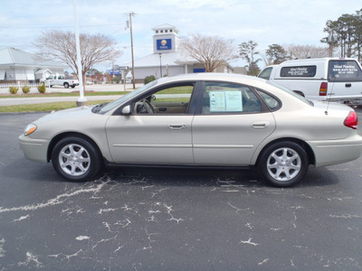 ford taurus 2006 beige sedan sel gasoline 6 cylinders front wheel drive automatic 28557