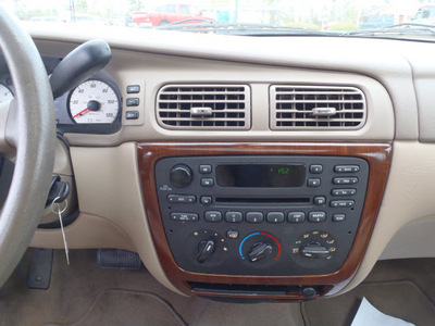 ford taurus 2006 beige sedan sel gasoline 6 cylinders front wheel drive automatic 28557