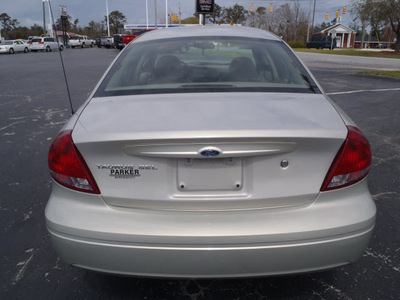 ford taurus 2006 beige sedan sel gasoline 6 cylinders front wheel drive automatic 28557