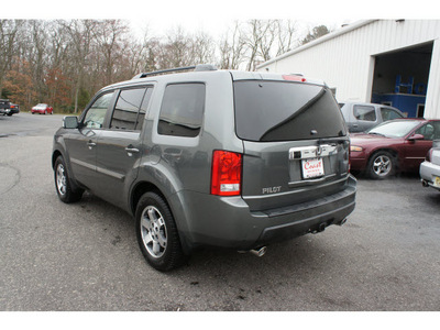 honda pilot 2009 sterling gray suv touring w navi gasoline 6 cylinders front wheel drive not specified 08750