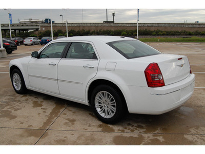 chrysler 300 2010 white sedan touring gasoline 6 cylinders rear wheel drive automatic 77065