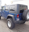 jeep wrangler unlimited 2009 blue suv rubicon gasoline 6 cylinders 4 wheel drive automatic with overdrive 98371