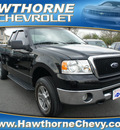 ford f 150 2007 black xlt gasoline 8 cylinders 4 wheel drive automatic 07507