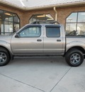 nissan frontier 2004 tan gasoline 6 cylinders 4 wheel drive not specified 43228