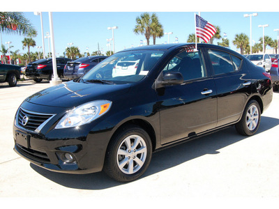 nissan versa 2012 black sedan 1 6 sl gasoline 4 cylinders front wheel drive automatic with overdrive 77065