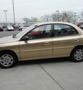 kia rio 2002 gold sedan gasoline 4 cylinders front wheel drive 43228