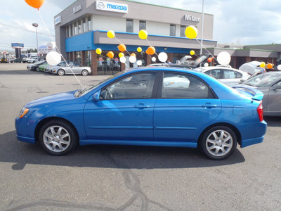kia spectra 2006 blue sedan sx gasoline 4 cylinders front wheel drive 5 speed manual 98371