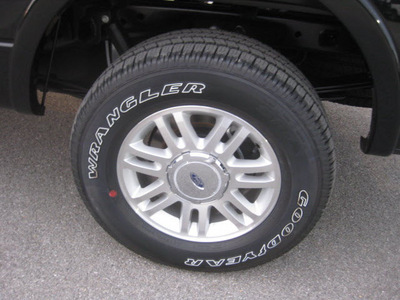 ford f 150 2012 black lariat flex fuel 8 cylinders 4 wheel drive 6 speed automatic 62863