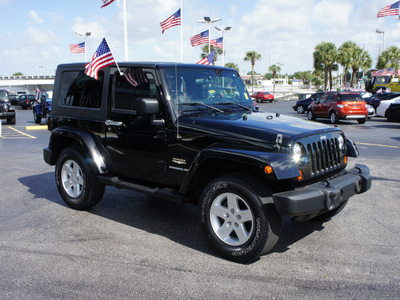 jeep wrangler 2007 black suv sahara gasoline 6 cylinders 4 wheel drive automatic 33021