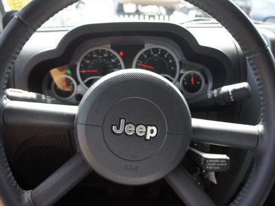 jeep wrangler 2007 black suv sahara gasoline 6 cylinders 4 wheel drive automatic 33021