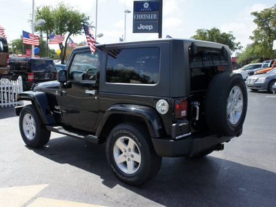 jeep wrangler 2007 black suv sahara gasoline 6 cylinders 4 wheel drive automatic 33021