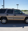 chevrolet tahoe 2003 tan suv gasoline 8 cylinders rear wheel drive automatic 76087