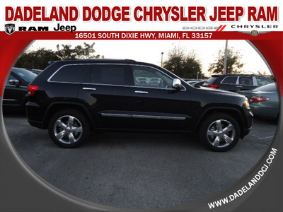 jeep grand cherokee 2012 black suv overland summit gasoline 8 cylinders 4 wheel drive automatic 33157