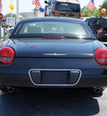 ford thunderbird 2002 black deluxe gasoline 8 cylinders rear wheel drive automatic 33021