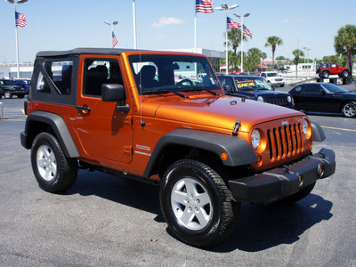 jeep wrangler 2011 orange suv sport gasoline 6 cylinders 4 wheel drive 6 speed manual 33021