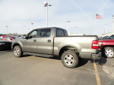 ford f 150 2006 gray xlt gasoline 8 cylinders 4 wheel drive automatic 60915