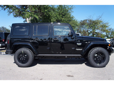 jeep wrangler unlimited 2012 black suv rubicon gasoline 6 cylinders 4 wheel drive automatic 33157