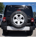jeep wrangler 2012 black suv sahara gasoline 6 cylinders 4 wheel drive automatic 33157