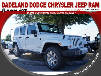 jeep wrangler unlimited 2012 white suv sahara gasoline 6 cylinders 4 wheel drive automatic 33157