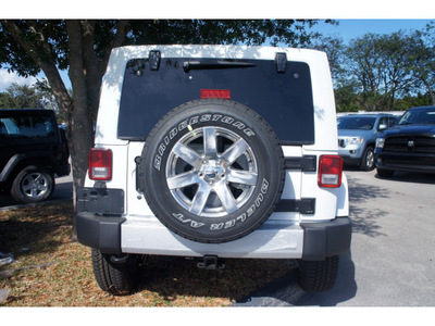 jeep wrangler unlimited 2012 white suv sahara gasoline 6 cylinders 4 wheel drive automatic 33157