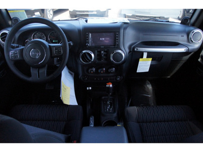 jeep wrangler unlimited 2012 black suv sahara gasoline 6 cylinders 4 wheel drive automatic 33157