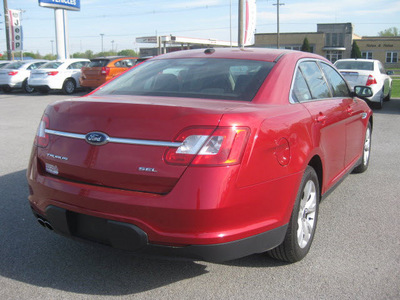 ford taurus 2010 red sedan sel gasoline 6 cylinders front wheel drive automatic 62863