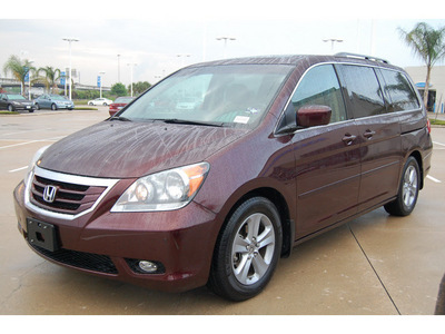 honda odyssey 2010 dk  red van touring gasoline 6 cylinders front wheel drive automatic with overdrive 77065