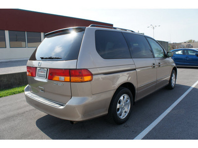 honda odyssey 2004 gold van ex l w dvd gasoline 6 cylinders front wheel drive 5 speed automatic 47129