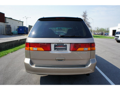honda odyssey 2004 gold van ex l w dvd gasoline 6 cylinders front wheel drive 5 speed automatic 47129