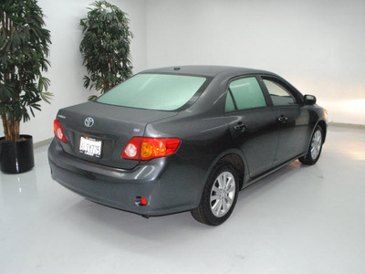 toyota corolla 2010 dk  gray sedan le gasoline 4 cylinders front wheel drive automatic 91731