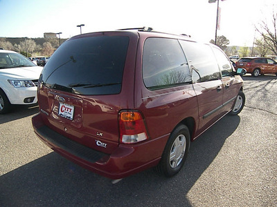 ford windstar 2003 red van lx gasoline 6 cylinders front wheel drive automatic 81212