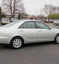toyota camry 2004 silver sedan xle gasoline 4 cylinders front wheel drive automatic with overdrive 55124