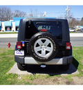 jeep wrangler unlimited 2010 black suv sahara gasoline 6 cylinders 4 wheel drive automatic with overdrive 07712