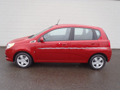 chevrolet aveo 2009 red hatchback aveo5 ls gasoline 4 cylinders front wheel drive 5 speed manual 98371