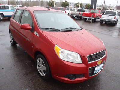 chevrolet aveo 2009 red hatchback aveo5 ls gasoline 4 cylinders front wheel drive 5 speed manual 98371