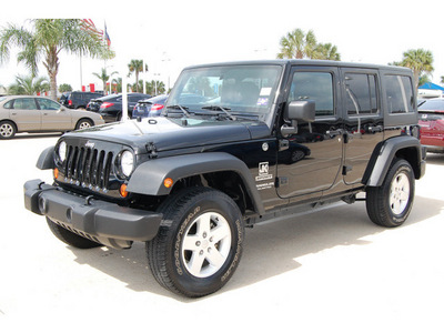 jeep wrangler unlimited 2011 black suv sport gasoline 6 cylinders 4 wheel drive automatic with overdrive 77065