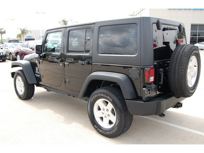 jeep wrangler unlimited 2011 black suv sport gasoline 6 cylinders 4 wheel drive automatic with overdrive 77065