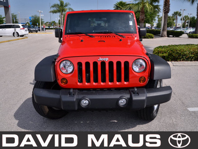 jeep wrangler unlimited 2010 red suv sport gasoline 6 cylinders 4 wheel drive 6 speed manual 32771