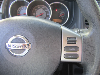 nissan versa 2009 lt  blue hatchback 1 8 sl gasoline 4 cylinders front wheel drive automatic 33157