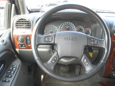 gmc envoy 2002 black suv slt gasoline 6 cylinders 4 wheel drive automatic 55811