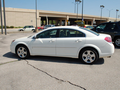 saturn aura 2007 white sedan xe gasoline 6 cylinders front wheel drive automatic 67210