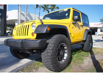 jeep wrangler 2009 yellow suv x gasoline 6 cylinders 4 wheel drive manual 33157