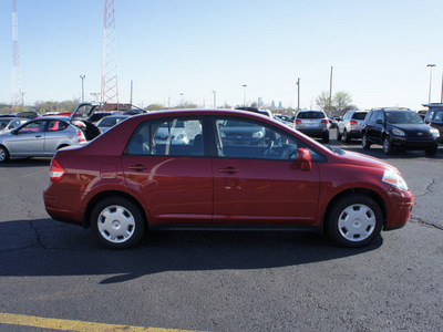 nissan versa 2010 red sedan gasoline 4 cylinders front wheel drive automatic 19153